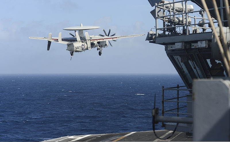 File:A U.S. Navy E-2C Hawkeye aircraft assigned to Airborne Early Warning Squadron (VAW) 115 flies past the aircraft carrier USS Nimitz (CVN 68) in the South China Sea Nov. 22, 2013 131122-N-TW634-246.jpg