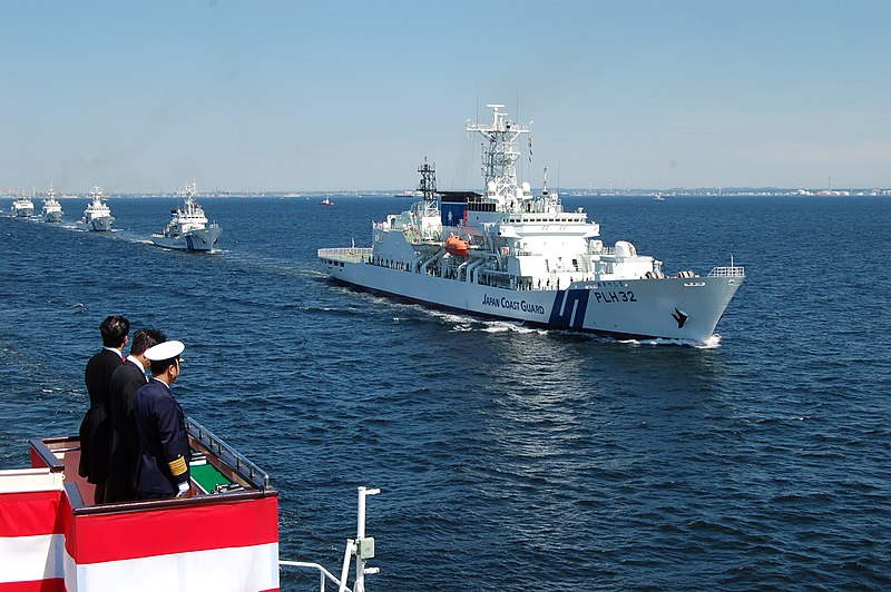 File:Abe and Ishii review ships of the JCG.jpg