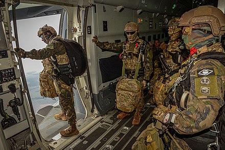 Special Forces in operational free-jump training on a C-390