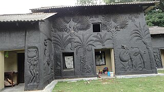 Art on an adobe building at Shantiniketan University, Bolpur, West Bengal