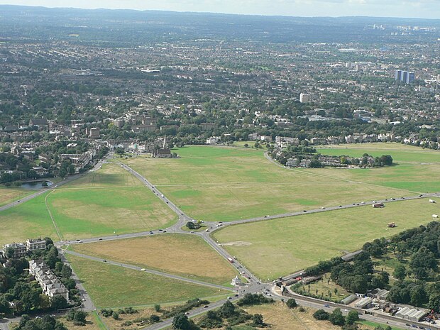 An aerial view of the heath looking south, with All Saints' Church in the centre rear of the heath