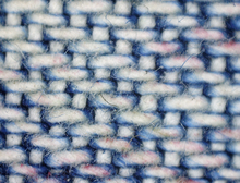 Microscopic image of faded fabric Blue jeans fading.png