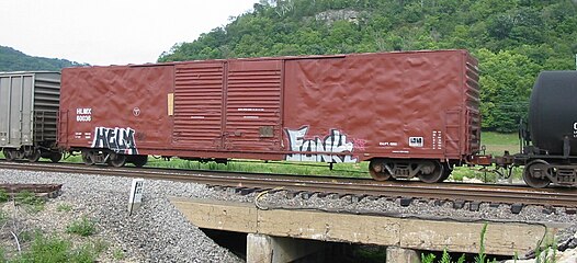 A double-door boxcar passes through Prairie du Chien, Wisconsin