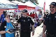 Colorado Rangers at a farmers' market. Colorado Rangers Policing a Large Event.jpg