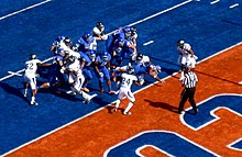 Martin (center) dives for a touchdown while playing for Boise State. Doug Martin TD vs Nevada 10 1 11.JPG