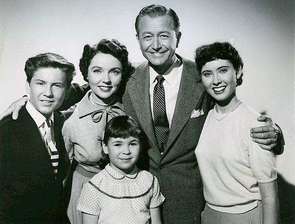 Cast photo of the Anderson family from the television program, Father Knows Best: (front) Lauren Chapin; (back, from left) Billy Gray, Jane Wyatt, Rob