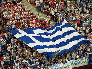Flag of Greece held by fans