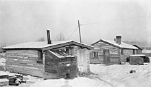 Hunt Houses built near the fort, 1910. The houses were built by Metis employees of the Hudson's Bay Company after the company relocated its operations near Fort Calgary. Hunt House.jpg
