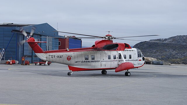Qeqertarsuaq Heliport is served in winter by the Sikorsky S-61N helicopter, seen here on the tarmac in Ilulissat Airport.