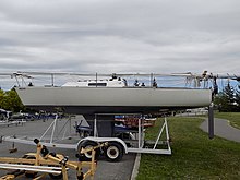 J-27 on its trailer, showing the fin keel and rudder configuration J27 sailboat 2718.jpg