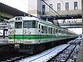 JNR 115 Series at Nitsu Station.jpg