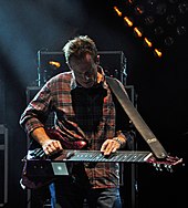 Jones playing a lap steel on stage, 2009 John-Paul-Jones1.jpg