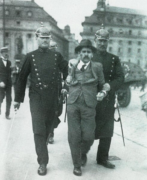 Stockholm police arresting a man for rioting, 1917