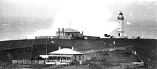 Kiama Light c. 1926 showing the principal and assistant keepers' houses. Kiama B&W 1926.jpg