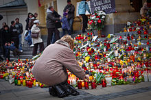 Flowers and candles in front of Lublin town hall