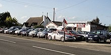 Used cars market: due to presence of fundamental asymmetrical information between seller and buyer the market equilibrium is not efficient; in the language of economists it is a market failure Morel's used cars - geograph.org.uk - 437167.jpg