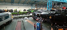 Locomotives arranged around the turntable in the Great Hall of the National Railway Museum NRM Great Hall merge2.jpg