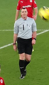 Neil Swarbrick (pictured in 2013) was the referee for the match. Neil Swarbrick 2013.jpg