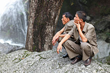 North Korean men wearing uniforms made from vinylon. North Korea - Myohyang Mountains (5015252383).jpg