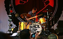 Carney playing with the Black Keys in 2010 Patrick Carney Central Park Summerstage 2010.jpg