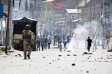 Police and protesters confronting each other in Kashmir, 2018 Police in Kashmir confronting violent protestors December 2018.jpg