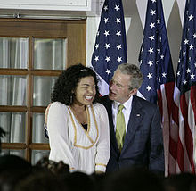 US President George W. Bush congratulates Sparks after she sang the U.S. national anthem during the welcome for President Bush and Laura Bush to the Ambassador's Residence in Ghana