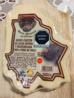 Mennonite Cheese, chester style from Chihuahua. This cheese is cut and packaged in the shape of the state of Chihuahua. Queso Chihuahua con forma del estado.png