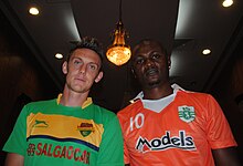 Scottish footballer Darryl Duffy in Salgaocar kit (in left), with arch-rival Sporting Goa's Odafa Onyeka Okolie in August 2015. Scottish footballer Darryl Duffy in Salgaocar kit (in left) and Odafa Onyeka Okolie of Nigeria in Sporting Goa kit, before an I-League match in August 2015.jpg