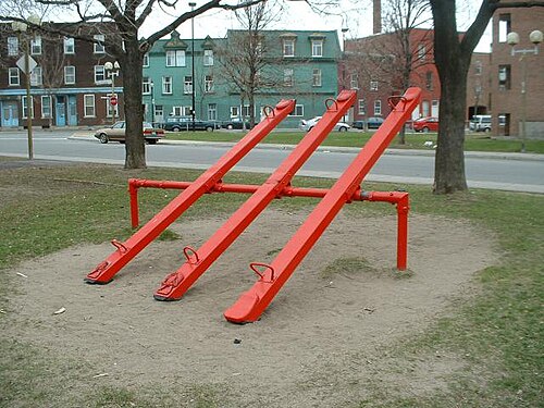 A set of conjoined playground seesaws