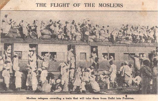 Photo from The Manchester Guardian of a group of Muslim migrants boarding a Pakistan-bound train in Delhi amidst the partition of India, c. 1947–1953