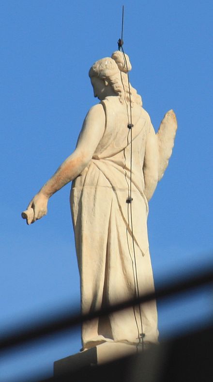 Lightning rod on a statue.