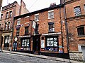 Stone Roses Bar, 4 King Street. c1860. Grade II listed.