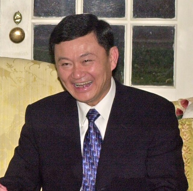 Thaksin meeting Donald Evans in December 2001