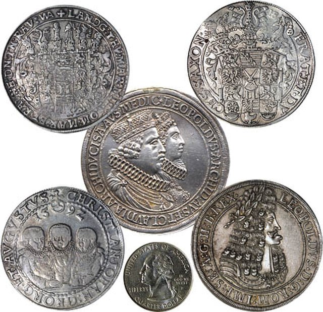 Four thalers and one double thaler, compared to a U.S. quarter (bottom center): Clockwise from top left: Saxe-Altenburg 1616 (reverse), Saxony 1592, A