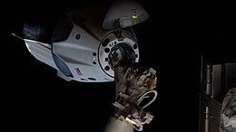 The SpaceX Crew Dragon approaches the International Space Station (iss063e021463).jpg