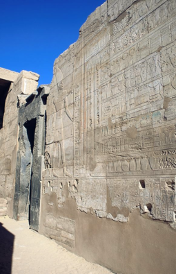 Annals of Thutmose III at Karnak depicting him standing before the offerings made to him after his foreign campaigns. ThutmosesIII-AnnalsOfThutmosesIII-Karnak.png