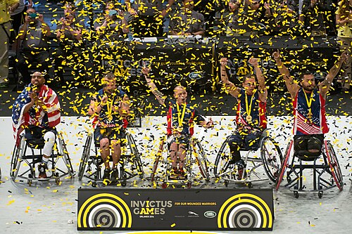 U.S. Invictus wheelchair basketball team members celebrate their gold medal win at the 2016 Invictus Games