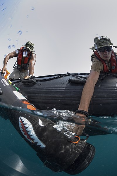 File:U.S. Navy Aerographer's Mate Airman Howell Walls and Aerographer's Mate 2nd Class Andrew Weisgerber, both assigned to Naval Oceanography Mine Warfare Center, place an unmanned underwater vehicle in 130517-N-OM642-032.jpg