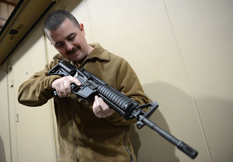 File:U.S. Navy Electronics Technician 1st Class Garrett Swanson, assigned to Commander, Task Force (CTF) 56, conducts a function check after reassembling an M4 carbine during weapons training at Naval Support 140212-N-OU681-165.jpg