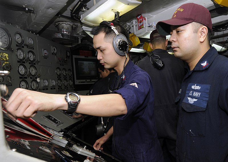 File:US Navy 100927-N-3729D-104 Electrician's Mate 2nd Class Ryan Manalo, left, conducts an electrical ground test under the supervision of Electrician'.jpg