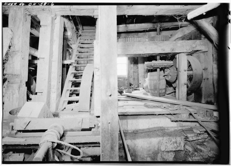 File:VIEW OF BASEMENT, LOOKING NORTHEAST TOWARD THIRD TURBINE. VISIBLE IS THE LINE SHAFTING THAT DROVE THE MILL'S WATER-POWERED MACHINERY. Photographer- Jet T. Lowe, 1985 - Alexander HAER OHIO,18-VAVI,2-6.tif