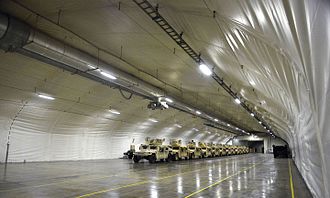 Vehicles inside one of the storage caves in 2015 Vehicles in a Marine Corps Prepositioning Program-Norway cave facility near Trondheim, Norway.jpg