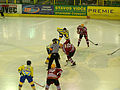 Zdeněk Sedlák of HC ZUBR Přerov and a player of VHK Vsetín at face-off during the 2nd National Hockey League's 4th play-off game