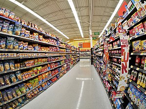 A supermarket aisle displaying many ultra-processed foods Walmart Wenatchee.jpg