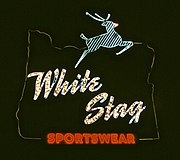 For 40 years the sign advertised White Stag Sportswear. This seasonal photo shows "Rudolph's" red nose. White Stag sign (night).jpg