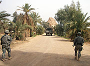 Ziggurat at Aqar Quf-American Soldiers approach the site