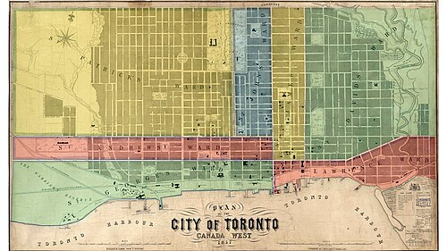 The map shows Toronto as it was in 1857 along with seven wards. St. Patrick's Ward in yellow. Its boundaries are Dufferin Street to the west, Bloor Street West to the north, University Avenue to the east and Queen Street to the South. St. Andrews Ward in red is located between Dufferin Street and Yonge Street, and Queen Street and King Street. St. George's Ward is located south of King Street to the Lakeshore and between Dufferin and Yonge Street.