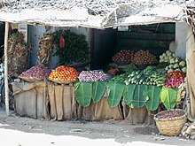 A vegetable shop in rural India 2010 Vegetable Shop ChinnaDharapuram , India.JPG