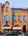 Two-storey, four-axis brick building