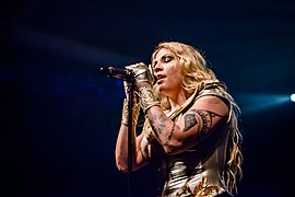 Singer Kobra Paige at a live performance in 2016